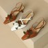 Women's Handmade Leather Elegant Stereoscopic Flower Cross Strap Mid Heel Sandals
